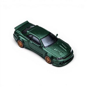 Lot57Supplies Diecast Shop dark green 1:64 Nissan Skyline GT-R R34 Smilodon diecast model with aggressive aero styling and gold wheels.