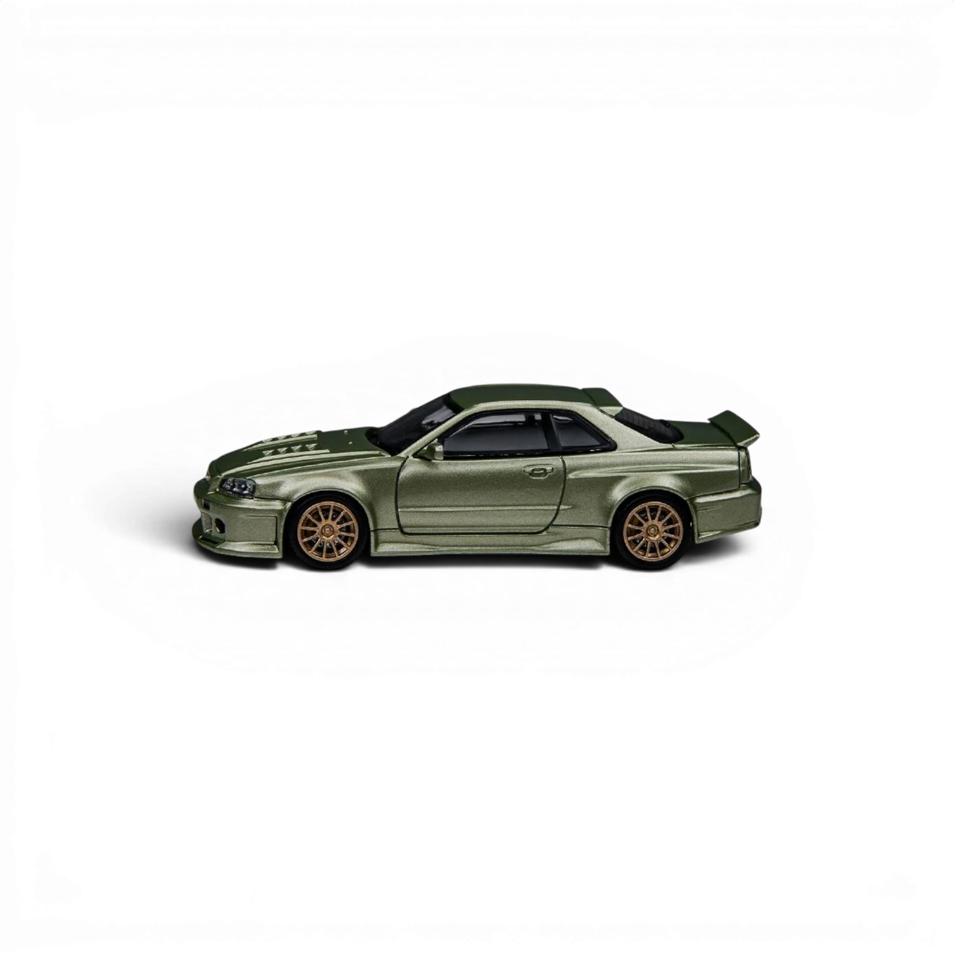 Lot57Supplies Diecast Shop Millennium Jade Nissan Skyline GT-R R34 Smilodon 1:64 scale diecast model with aggressive aero styling.