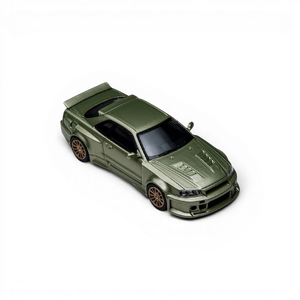 Lot57Supplies Diecast Shop Millennium Jade Nissan Skyline GT-R R34 Smilodon 1:64 scale diecast model with aggressive aero.