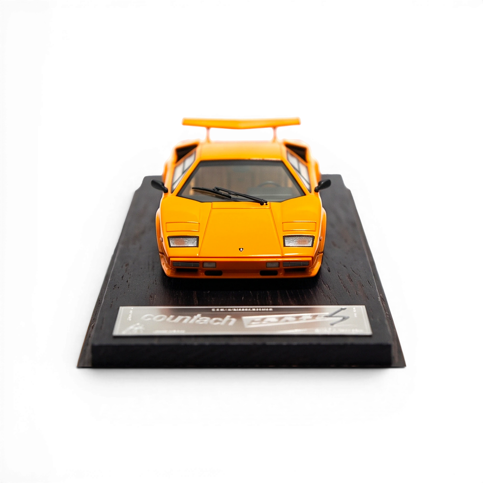 Lot57Supplies Diecast Shop DeepMaker 1:64 scale orange Lamborghini Countach 5000S resin model on a wooden base