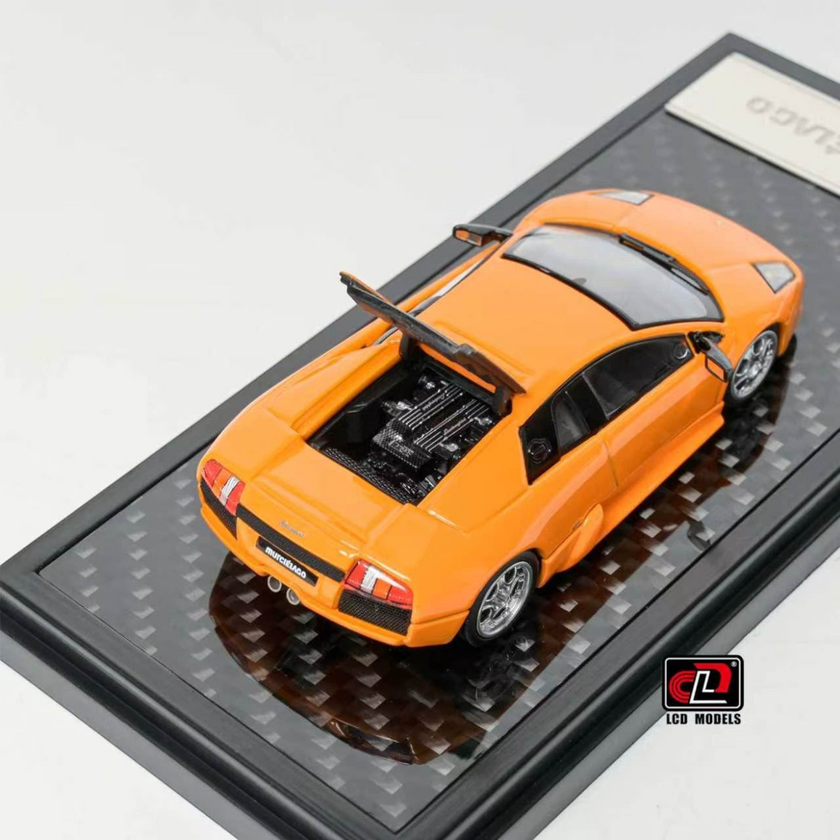 Lot57Supplies Diecast Shop 1:64 scale orange LCD Lamborghini Murciélago diecast model car with open engine bay