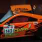 Lot57Supplies Diecast Shop 1:64 scale orange Nissan Fairlady Z Z33 Option Stream Z diecast model with racing decals