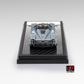 Lot57Supplies Diecast Shop LCD Pagani Utopia 1:64 scale diecast model car in ice blue, rear view on display base.