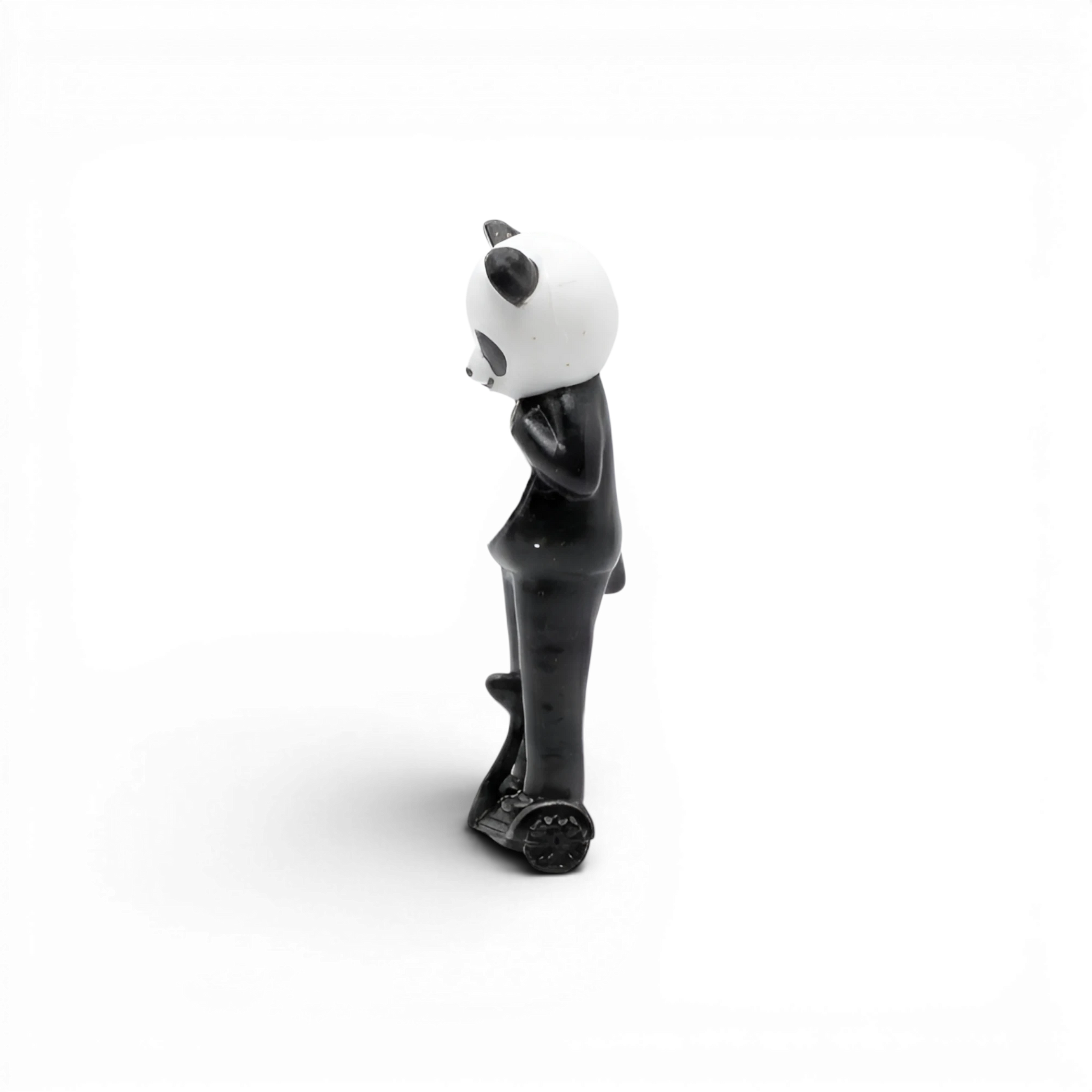 Lot57Supplies Diecast Shop Street Weapon 1:64 scale resin panda figure standing on a hoverboard, side view.