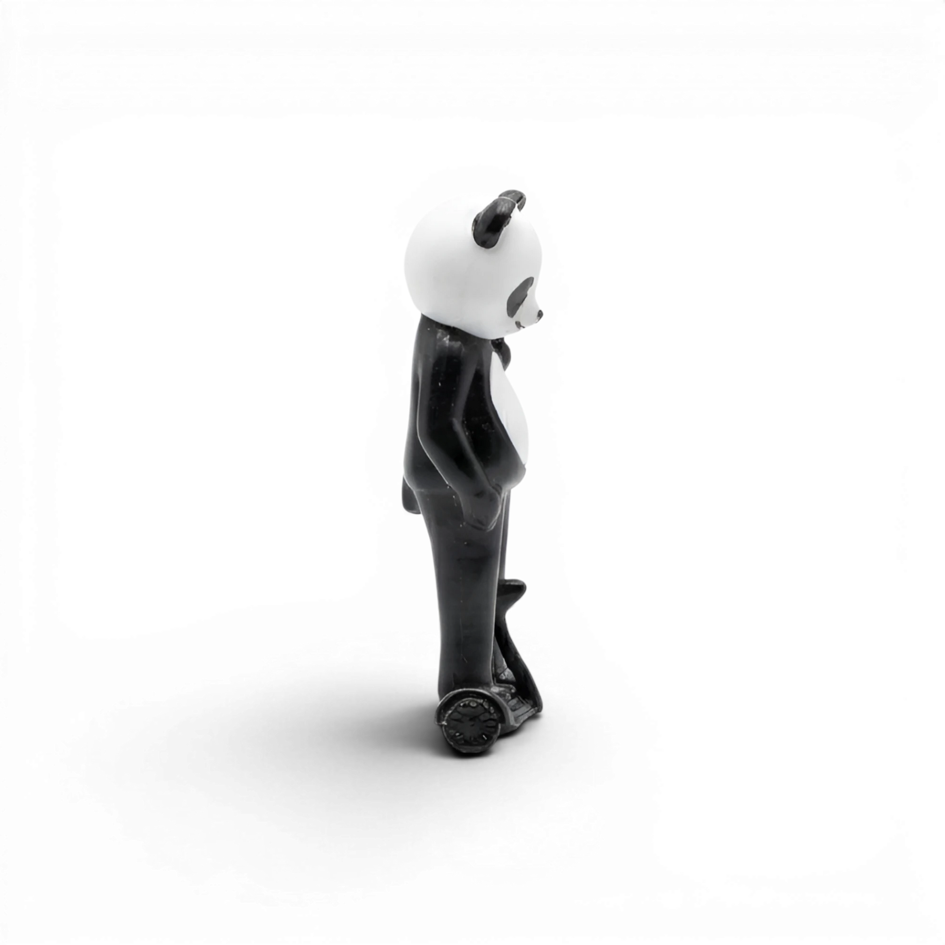 Lot57Supplies Diecast Shop Street Weapon 1:64 scale resin panda figure riding a hoverboard, side view