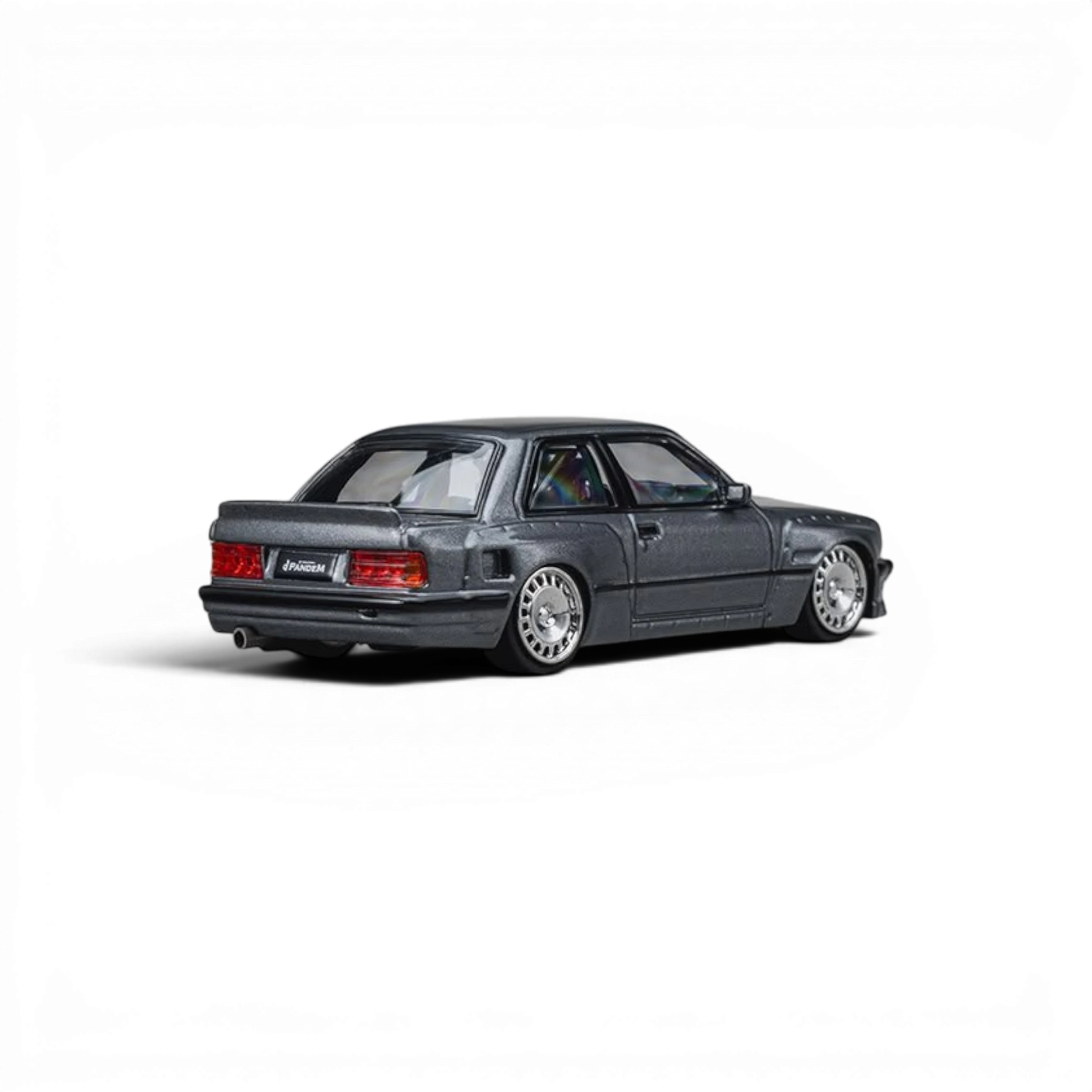 Lot57Supplies Diecast Shop CM Model Pandem M3 E30 diecast car in metallic gunmetal gray, rear three-quarter view.