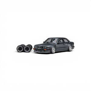 Lot57Supplies Diecast Shop 1:64 scale CM Model Pandem M3 E30 diecast car in metallic gunmetal gray with spare wheels