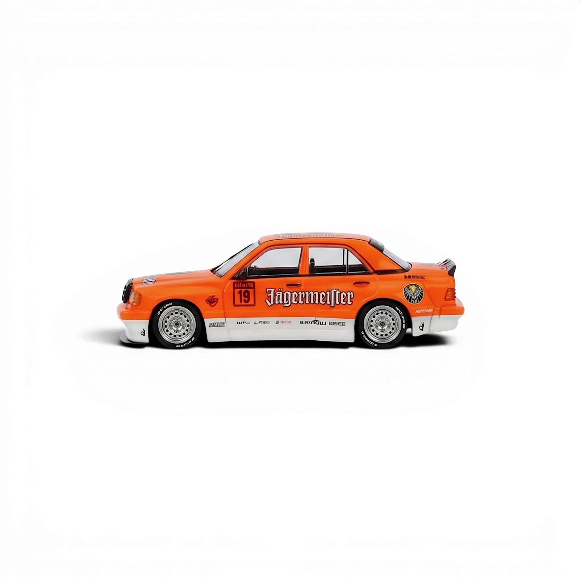 Lot57Supplies Diecast Shop INNO64 Pandem Rocket Bunny 190E diecast car in orange Jagermeister livery, side view.