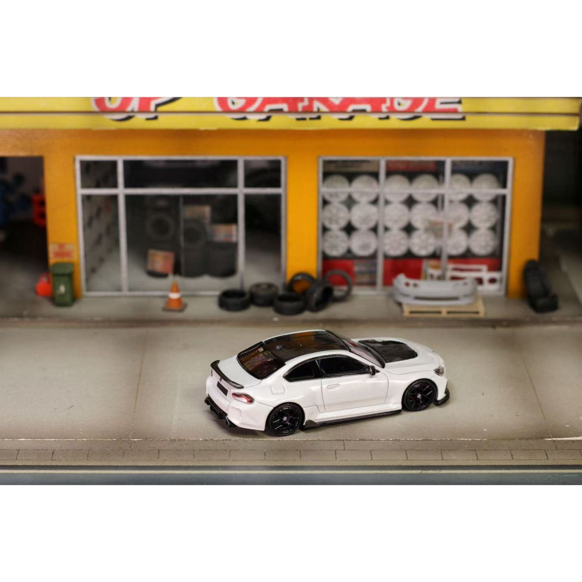 Lot57Supplies Diecast Shop 1:64 scale pearl white SW G87 M2 ADRO modified diecast car with low wing and black wheels