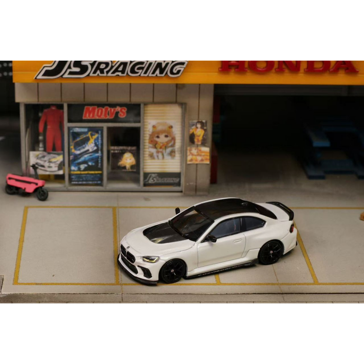 Lot57Supplies Diecast Shop 1:64 scale SW G87 M2 ADRO modified diecast car in pearl white with a low wing and black roof