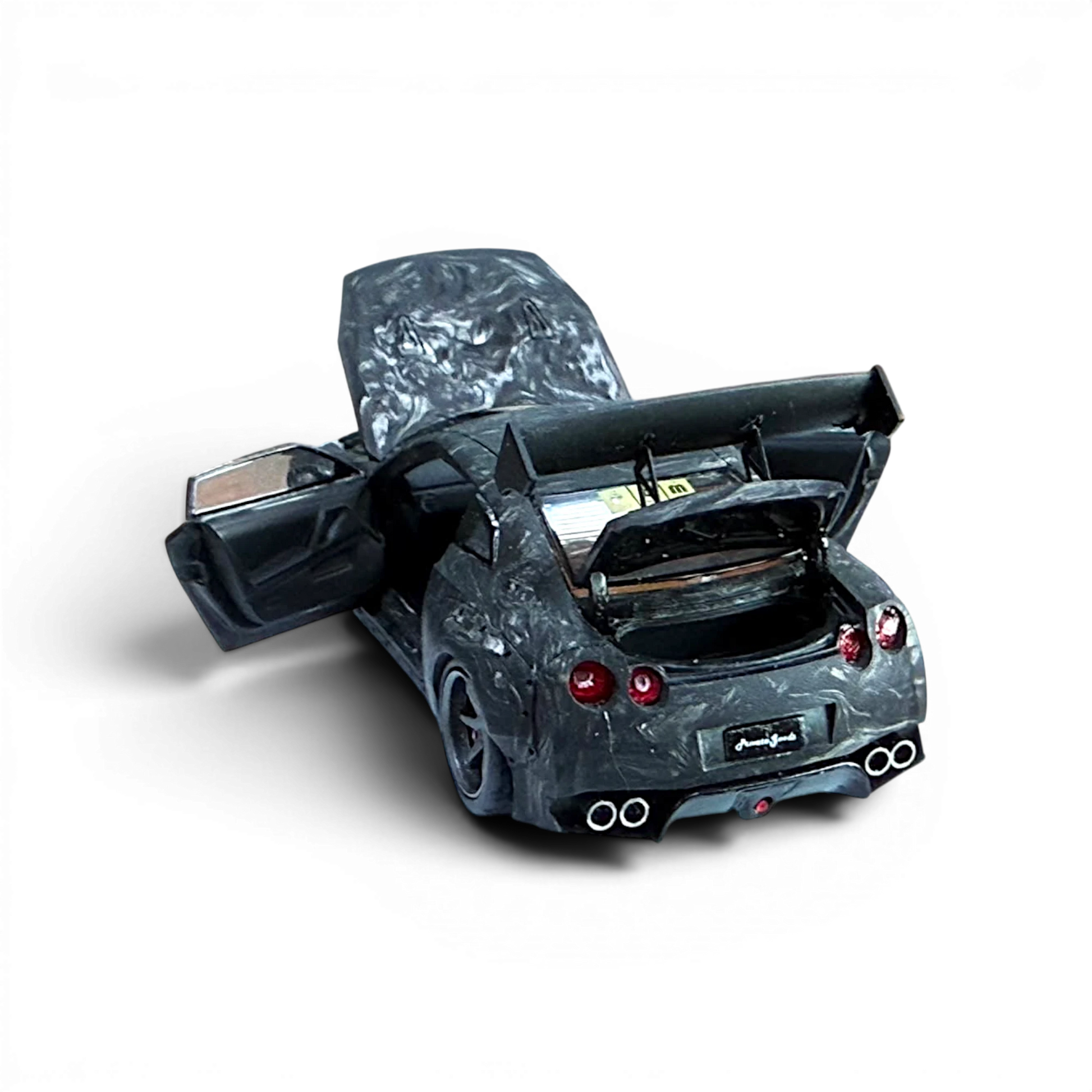 Lot57Supplies Diecast Shop PGM GTR R35 1:64 scale model in black carbon fiber with opening hood and trunk