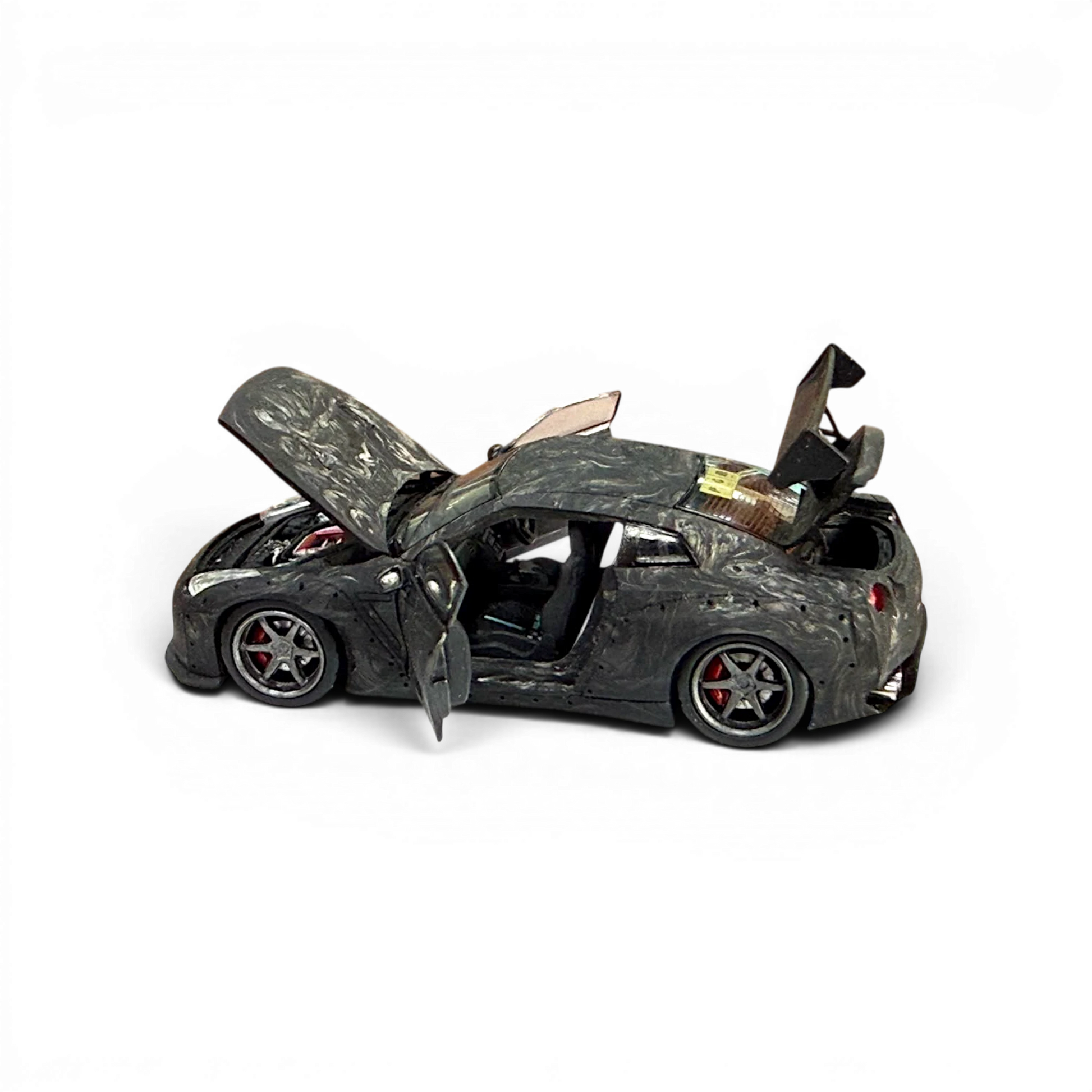 Lot57Supplies Diecast Shop PGM 1:64 scale GTR R35 diecast model car in black carbon fiber with opening doors and hood