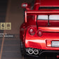 Lot57Supplies Diecast Shop PGM Nissan R35 widebody diecast car in metallic red, rear view with spoiler and quad exhaust