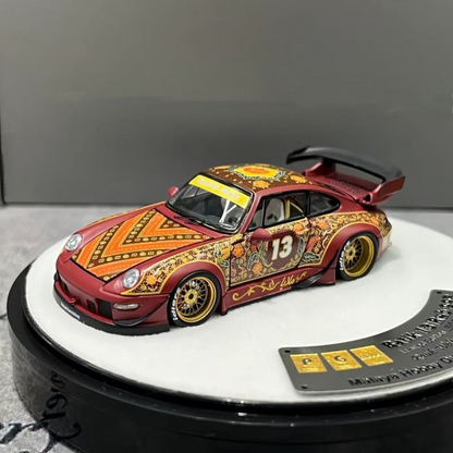 Lot57Supplies Diecast Shop PGM Porsche RWB 993 Batik 13 diecast car in red with gold alloys and intricate patterns