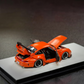 Lot57Supplies Diecast Shop PGM RWB 993 matte orange diecast model car with opening doors and hood on display base