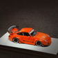 Lot57Supplies Diecast Shop PGM RWB 993 matte orange diecast model car in 1:64 scale with widebody kit and rear spoiler