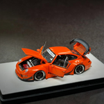Lot57Supplies Diecast Shop PGM RWB 993 diecast model car in matte orange with opening doors, hood, and engine cover.