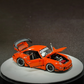Lot57Supplies Diecast Shop PGM RWB 993 diecast model car in bright orange with opening doors, hood, and engine bay.