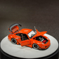 Lot57Supplies Diecast Shop 1:64 scale PGM RWB 993 diecast model car in bright orange with opening doors and hood
