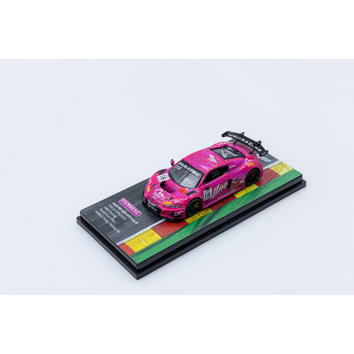 Lot57Supplies Diecast Shop 1:64 scale pink Audi R8 LMS GT3 EVO II diecast model car on a display base
