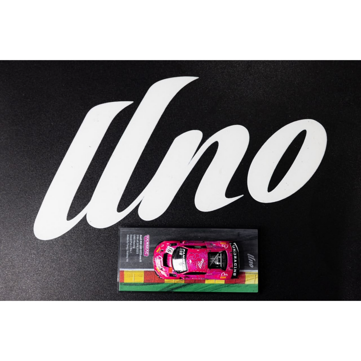 Lot57Supplies Diecast Shop 1:64 scale pink Audi R8 LMS GT3 EVO II diecast model car on a branded display base