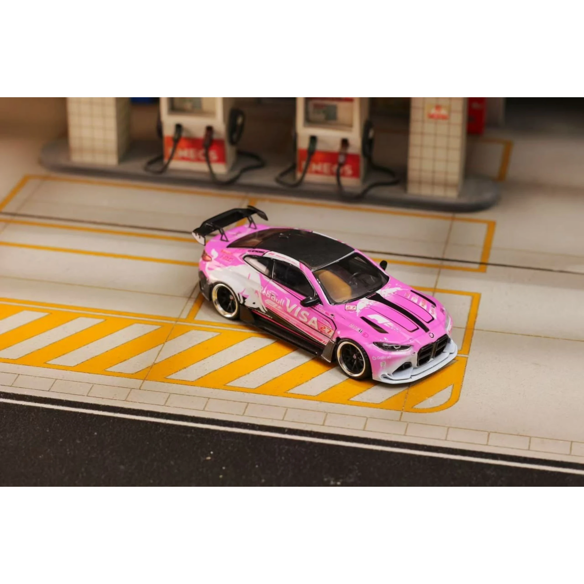 Lot57Supplies Diecast Shop 1:64 scale SW G82 M4 diecast model car featuring a custom pink bull livery and rear spoiler
