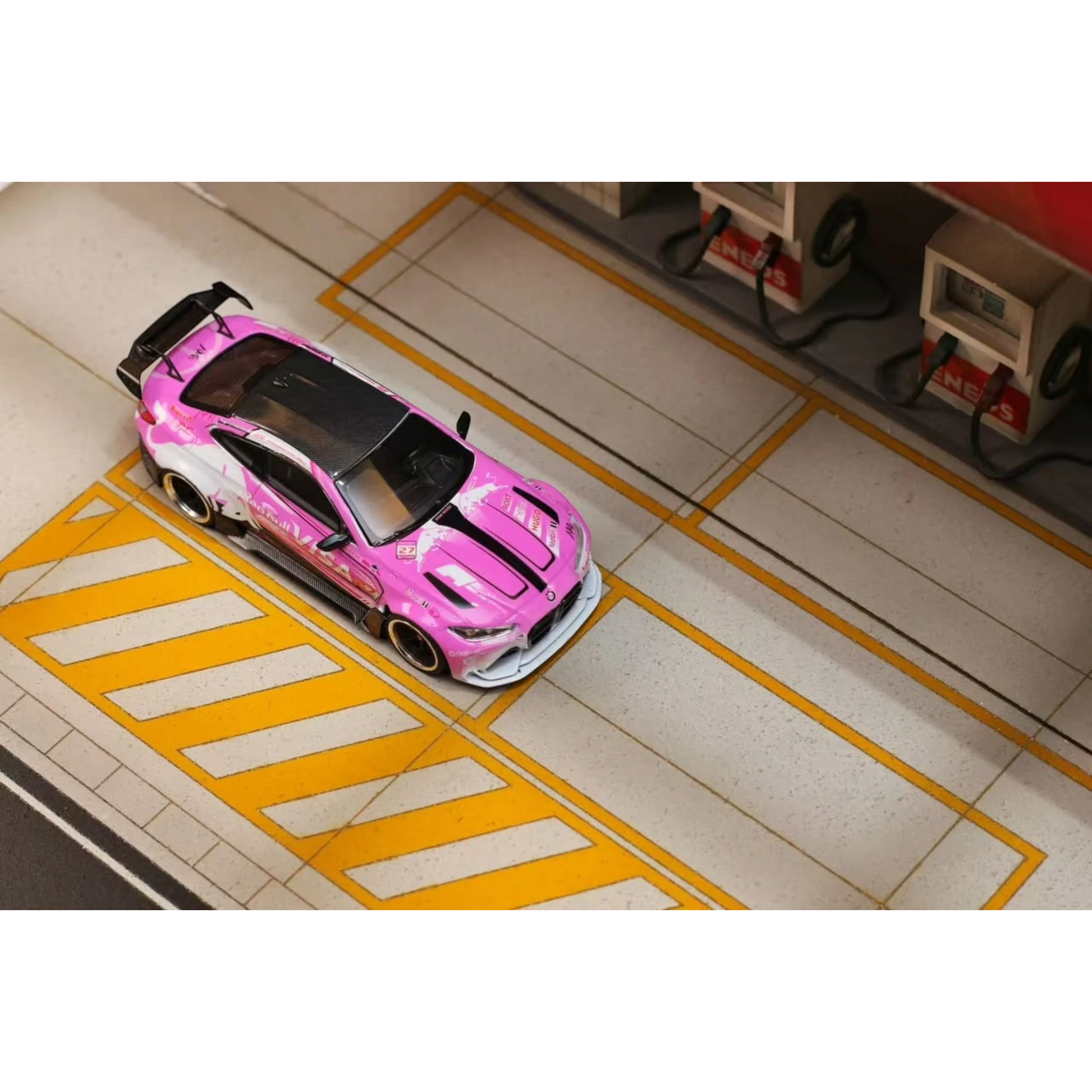 Lot57Supplies Diecast Shop 1:64 scale SW G82 M4 diecast model car featuring a vibrant pink bull livery design.