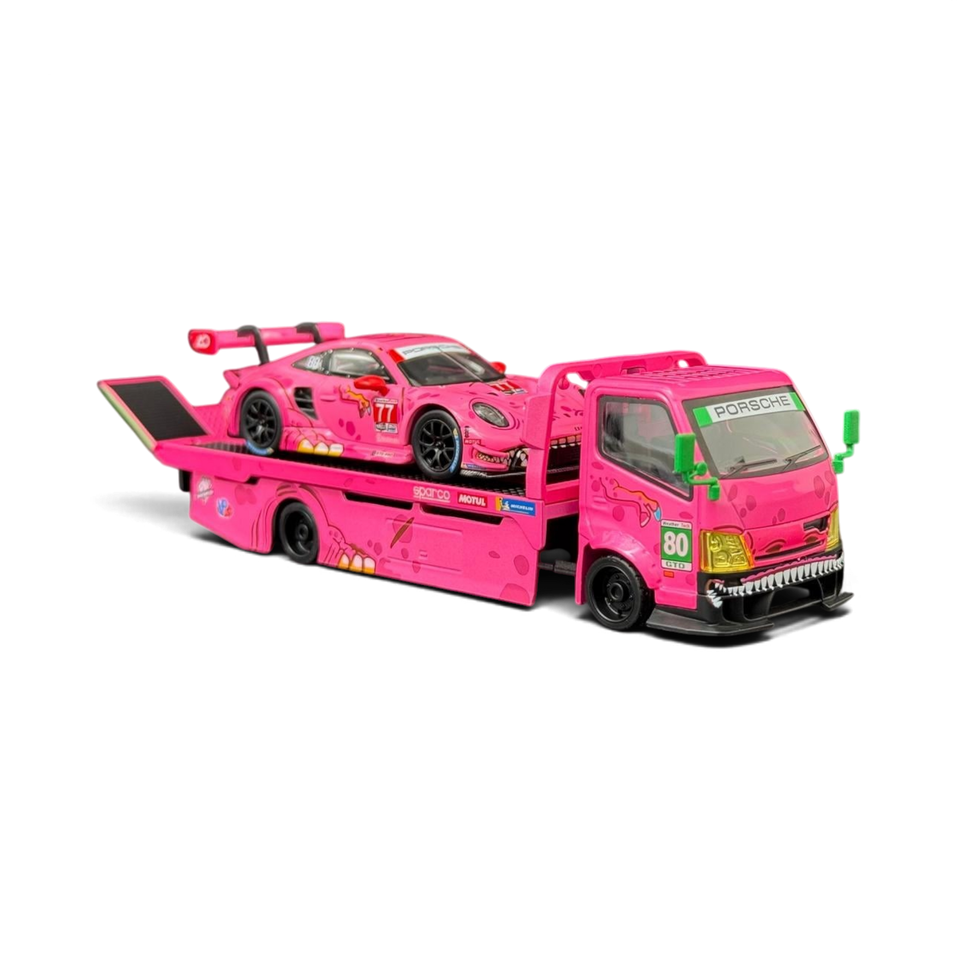 Lot57Supplies Diecast Shop 1:64 scale pink Hino 300 Dino hauler truck carrying a Porsche 911 GT3 R ROXY race car.