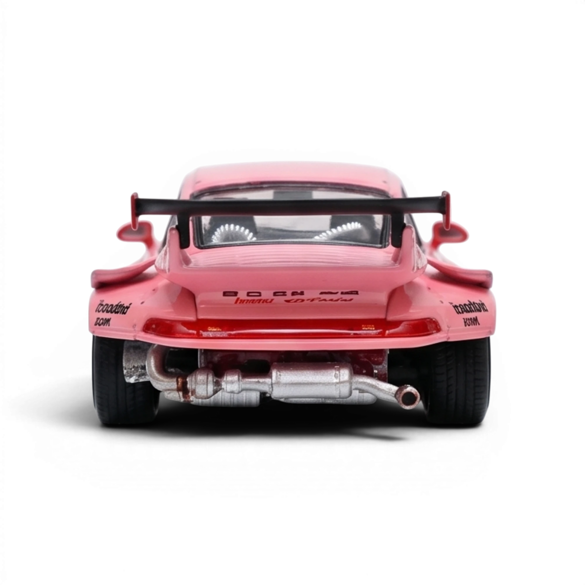 Lot57Supplies Diecast Shop pink RWB 993 1:64 scale diecast model car with rear spoiler and detailed exhaust.
