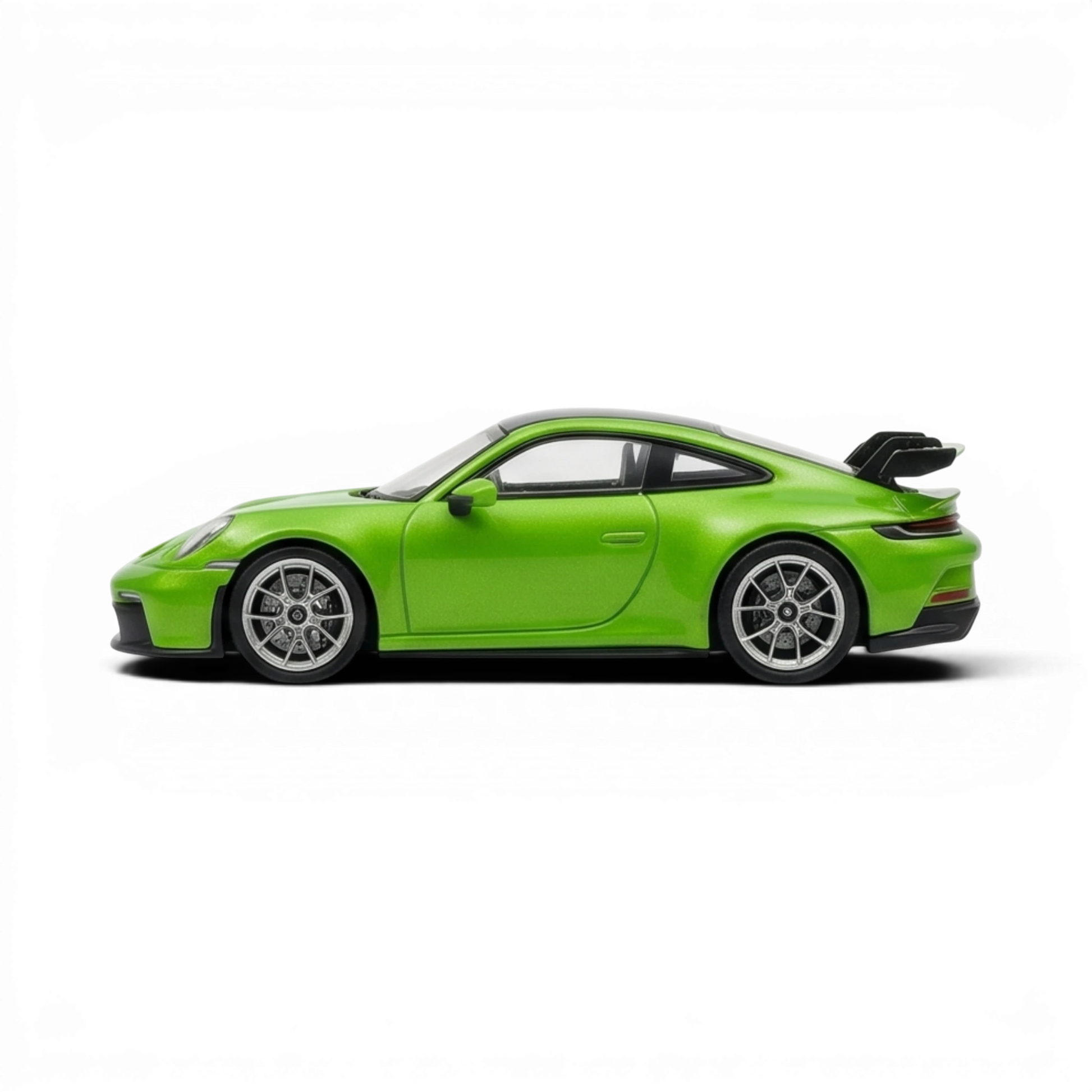 Lot57Supplies Diecast Shop green 1:64 scale resin Porsche 911 GT3 model with detailed wheels and rear spoiler.