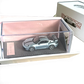 Lot57Supplies Diecast Shop ZJWJ 1:64 scale ice blue Porsche 911 GT3 resin model car on a velvet base in acrylic case