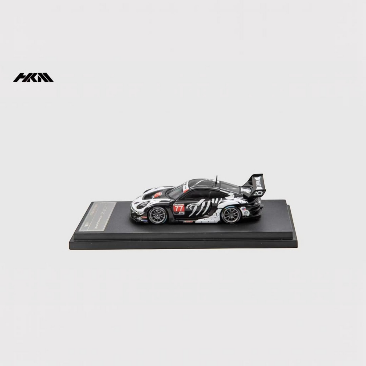 Lot57Supplies Diecast Shop HKM Porsche 911 GT3 R Rennsport diecast model car with black and white dinosaur livery