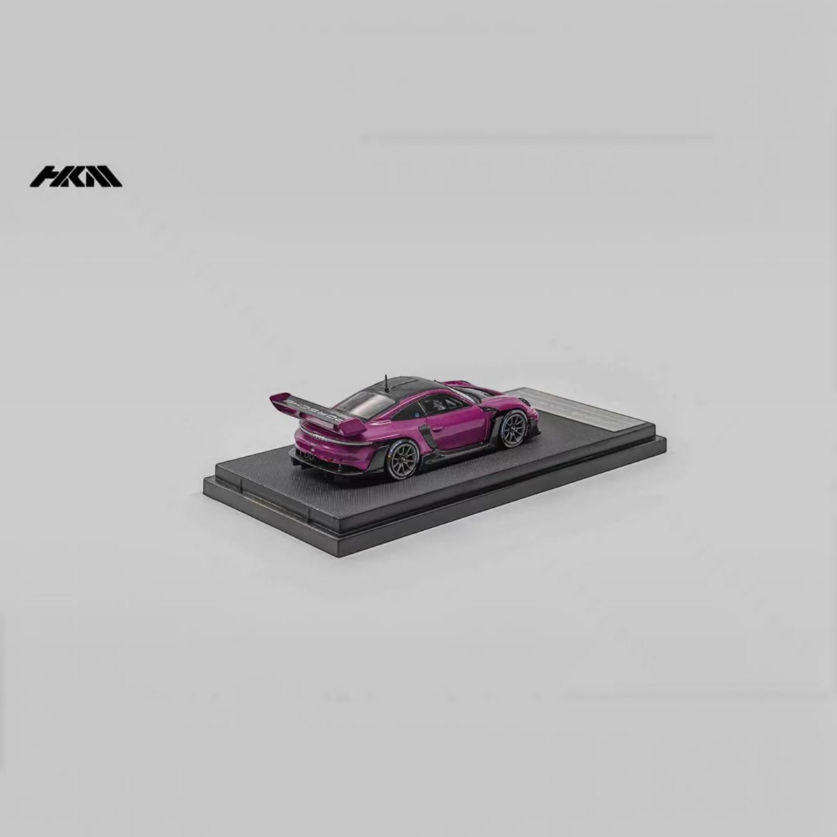 Lot57Supplies Diecast Shop HKM Porsche 911 992 GT3 R Rennsport diecast model in Ruby Star on a display base
