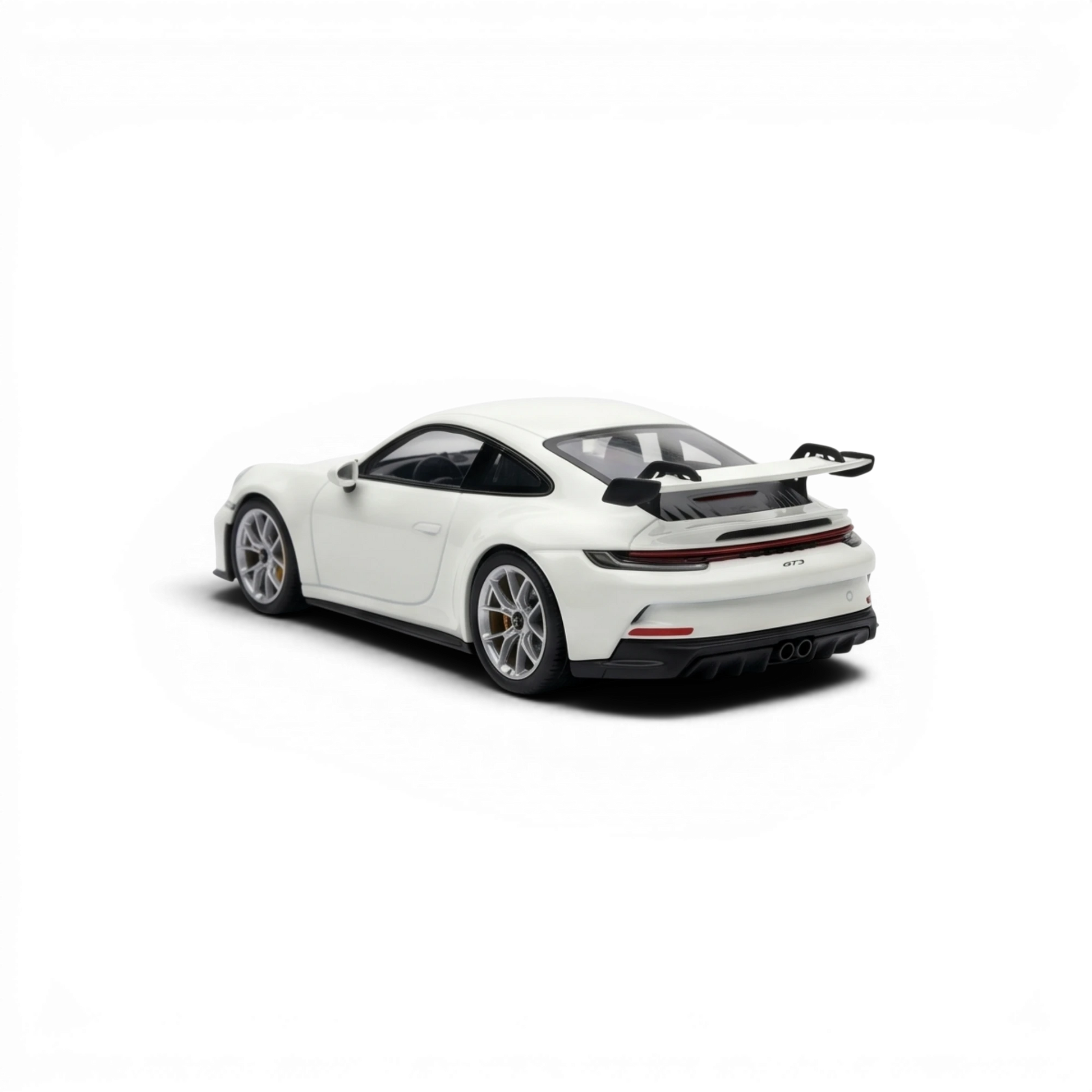 Lot57Supplies Diecast Shop 1:64 scale luminous white Porsche 911 GT3 resin model with a large rear spoiler and silver wheels.