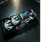 Lot57Supplies Diecast Shop HubAuto Porsche 911 GT3R 1:64 scale diecast model with iridescent purple and green livery