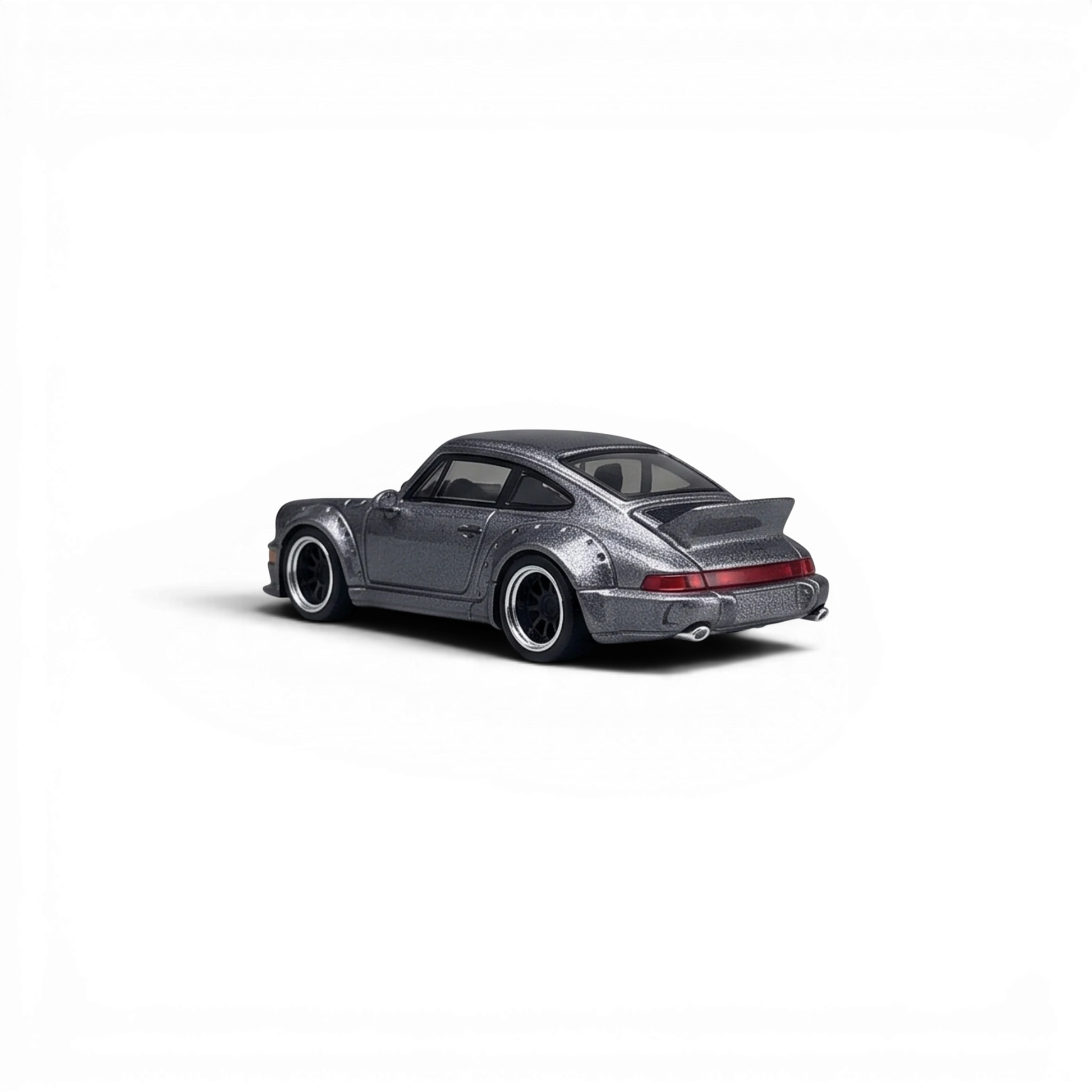 Lot57Supplies Diecast Shop metallic gray CM Model Porsche 964 widebody 1:64 scale diecast car, rear three-quarter view.