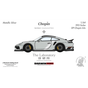 Lot57Supplies Diecast Shop metallic silver 1:64 Porsche 992 Turbo Chopin Kit resin model car with yellow brake calipers.