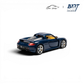 Lot57Supplies Diecast Shop blue 1:64 scale resin Porsche Carrera GT model with yellow interior.