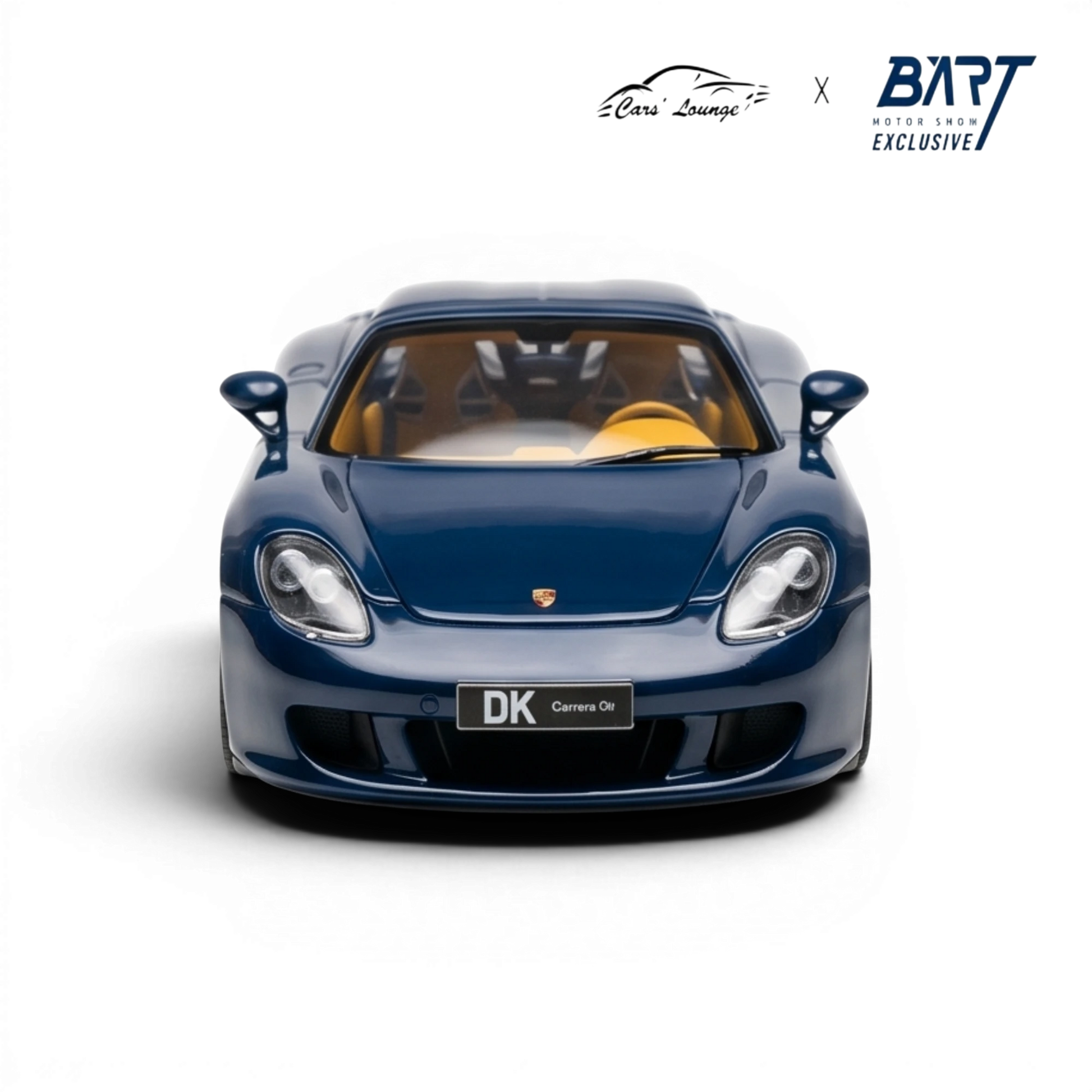 Lot57Supplies Diecast Shop blue resin 1:64 scale Porsche Carrera GT model with yellow interior.