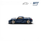Lot57Supplies Diecast Shop 1:64 scale blue resin Porsche Carrera GT model with yellow interior.