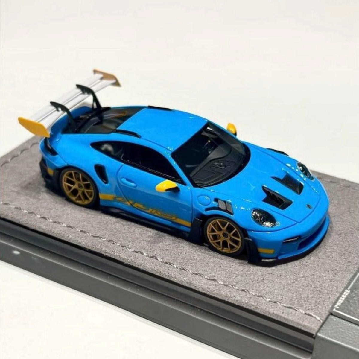 Lot57Supplies Diecast Shop HH Model 1:64 scale resin Porsche 992.1 GT3 RS in Riviera Blue with gold wheels