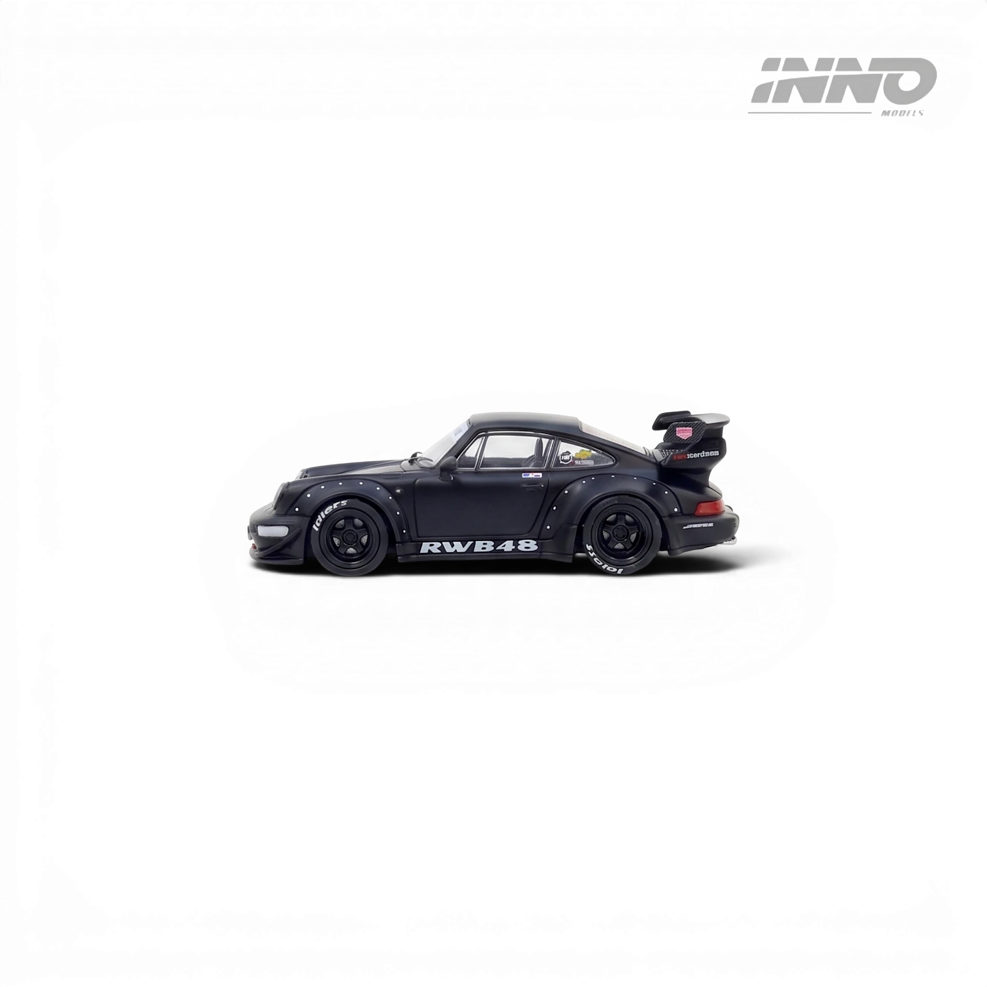 Lot57 Supplies Diecast Shop: Black Matt Porsche RWB 964 Darth Vader 1:64 scale diecast model with wide body kit and rear spoiler.