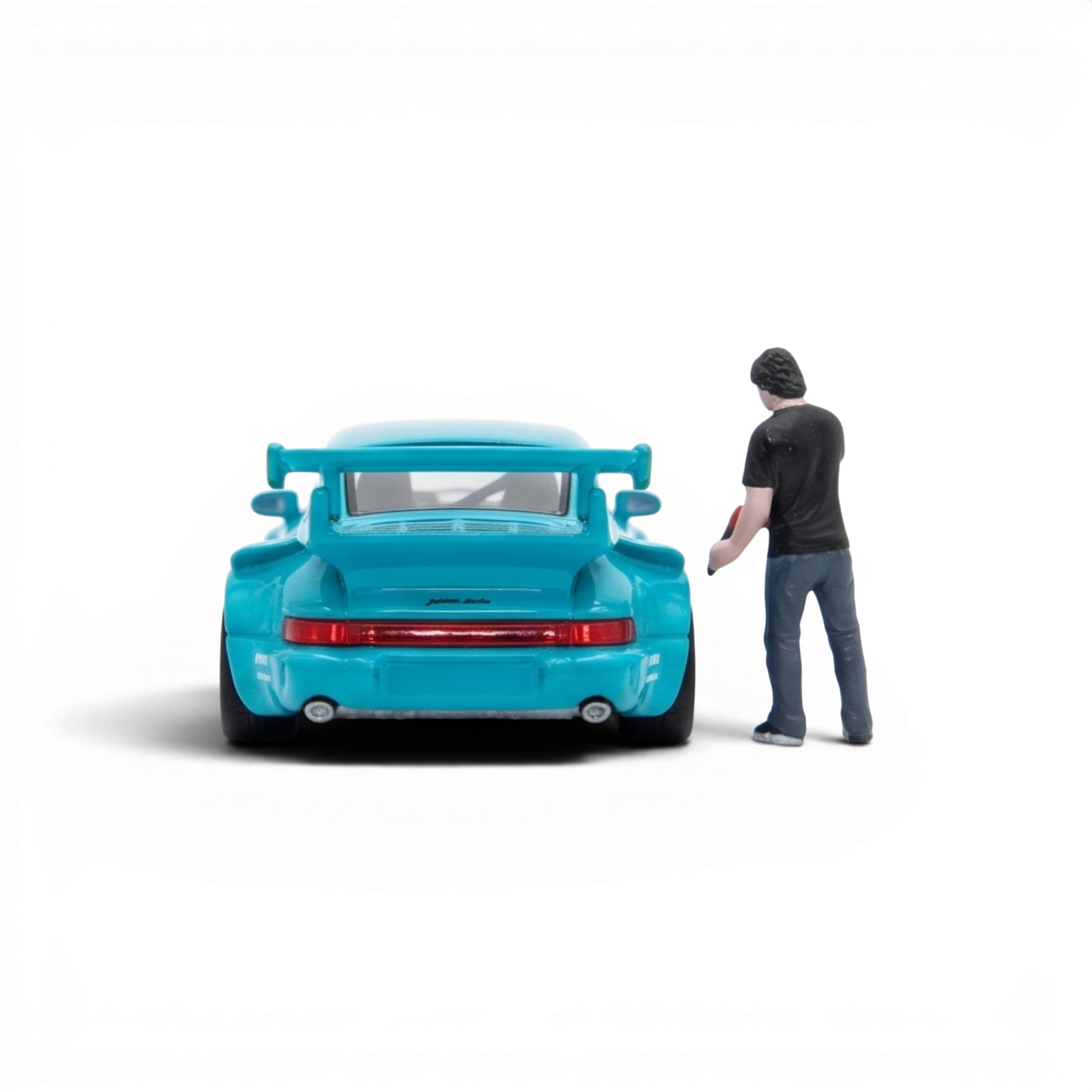 Lot57Supplies Diecast Shop Star Model Porsche RWB 964 green diecast car in 1:64 scale with a standing figure