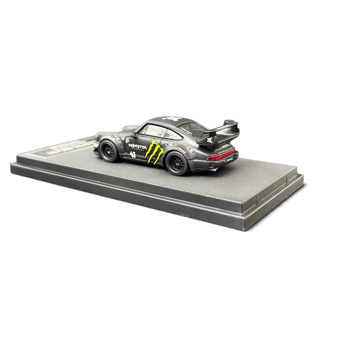 Lot57Supplies Diecast Shop Mini Station Porsche RWB 964 diecast model car in black with Monster Energy livery