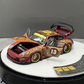 Lot57Supplies Diecast Shop PGM Porsche RWB 993 Batik 13 diecast model car in red with gold alloys and intricate patterns