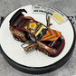 Lot57Supplies Diecast Shop PGM Porsche RWB 993 Batik 13 diecast model in red with gold alloys and intricate patterns.