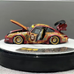 Lot57Supplies Diecast Shop PGM Porsche RWB 993 Batik 13 diecast model in red with gold alloys and intricate patterns.