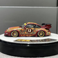 Lot57Supplies Diecast Shop PGM Porsche RWB 993 Batik 13 diecast car in red with gold alloys and intricate patterns