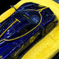Lot57Supplies Diecast Shop 1:64 scale purple carbon fiber Pagani Huayra R model car with yellow racing stripes
