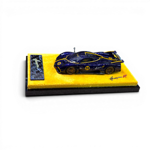Lot57Supplies Diecast Shop 1:64 scale purple carbon fiber Pagani Huayra R resin model car on a yellow display base